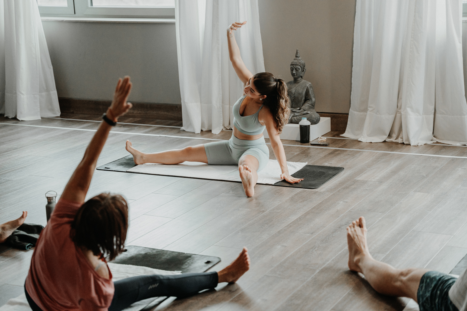 Seated stretch with members following along